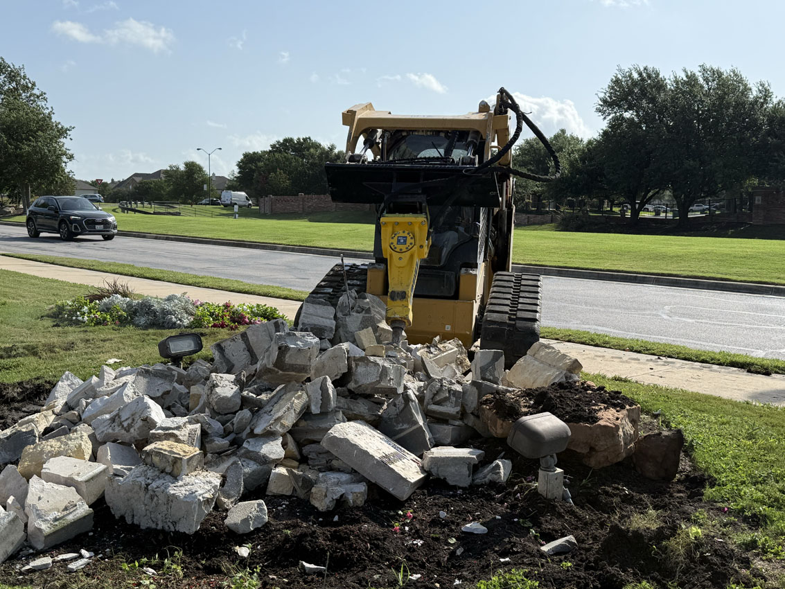 Structure demolition and debris removal on a job site
