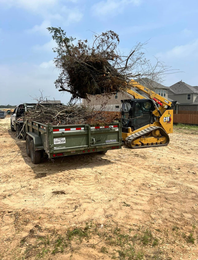 Demolition debris loaded for hauloff and disposal