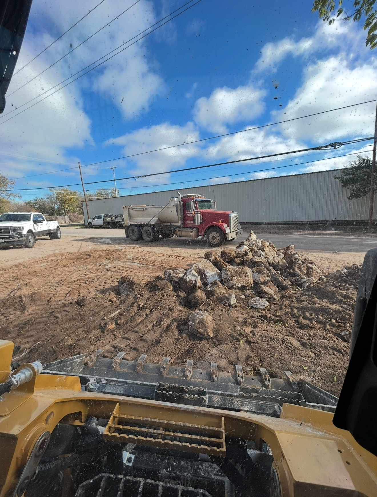 Land clearing with excavation and dirt work in progress