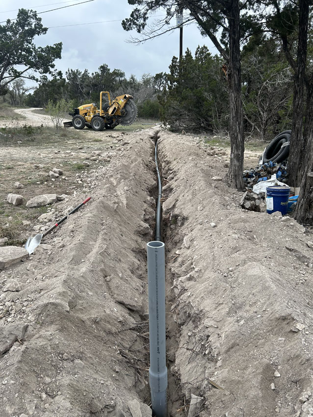 Underground utility pipe installation on a job site