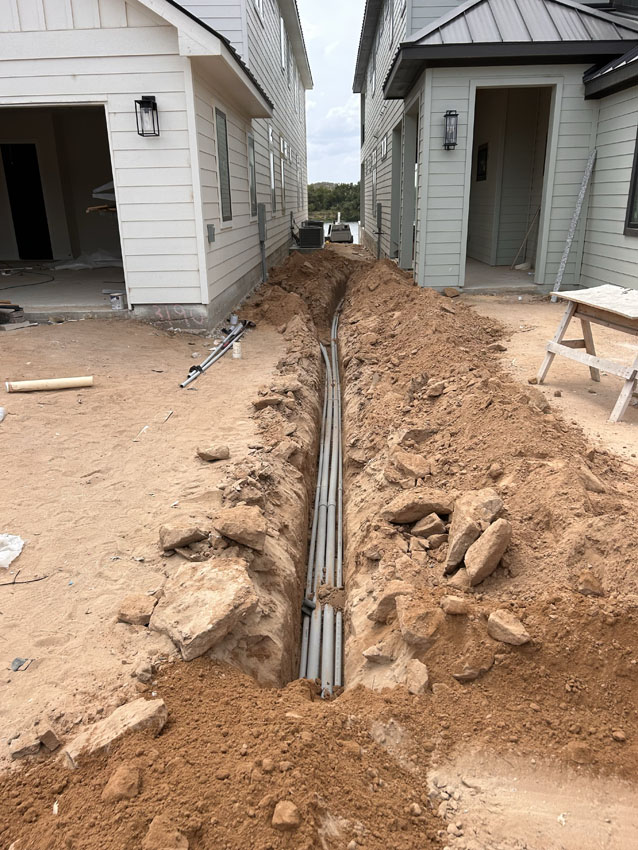 Trenching and underground utility work in progress